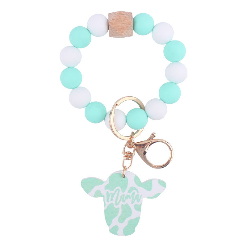 Wholesale Silicone Beads Cartoon Western Style Bull Head Wooden Sign Pendant Bracelet Keychains